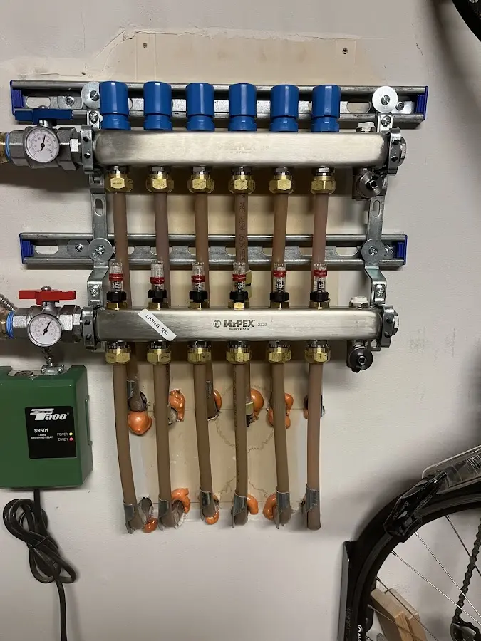 Plumber performing Water Heater Repair at a residential property in Zionsville